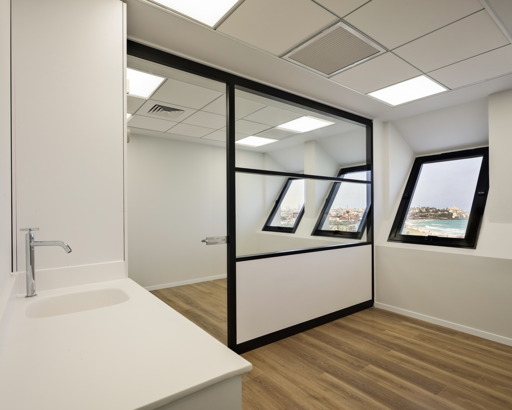 Open-plan office looking out to the private courtyard